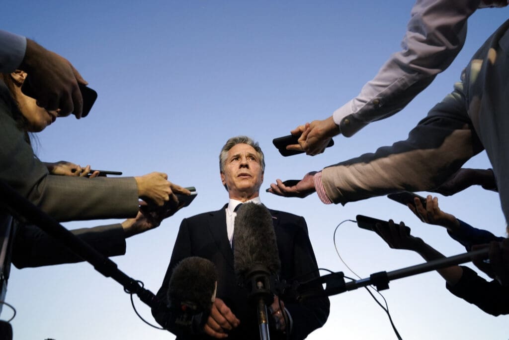US Secretary of State Antony Blinken speaks to the media before boarding his plane in Cairo en route to Jordan on October 15, 2023. Blinken said October 15 there was a consensus among the United States' Arab allies to contain the Israel conflict with Hamas in the Gaza Strip. (Photo by Jacquelyn Martin / POOL / AFP)